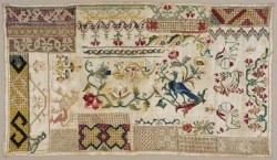 Sampler imparaticcio con schemi e cornici.